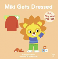 Mili gets dressed